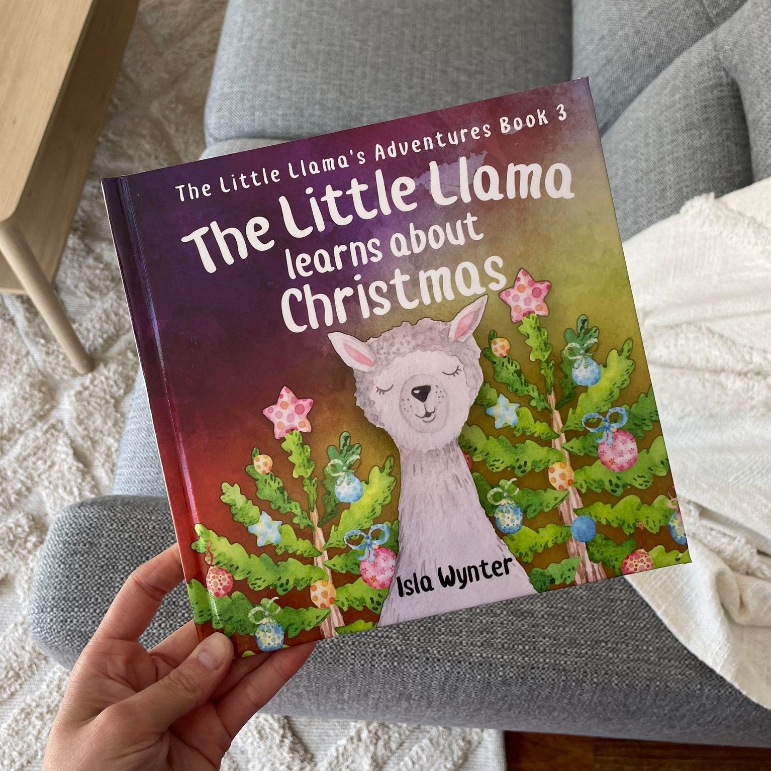 The Little Llama Learns About Christmas: HARDCOVER by Isla Wynter